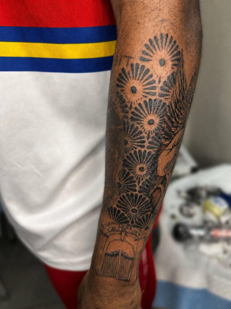Black and grey tattoo by Woke Tattoo Studio
