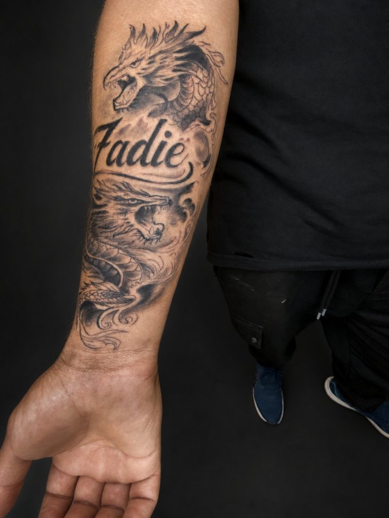 Black and grey tattoo by Woke Tattoo Studio