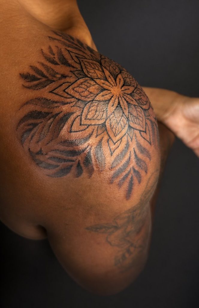 Black and grey tattoo by Woke Tattoo Studio