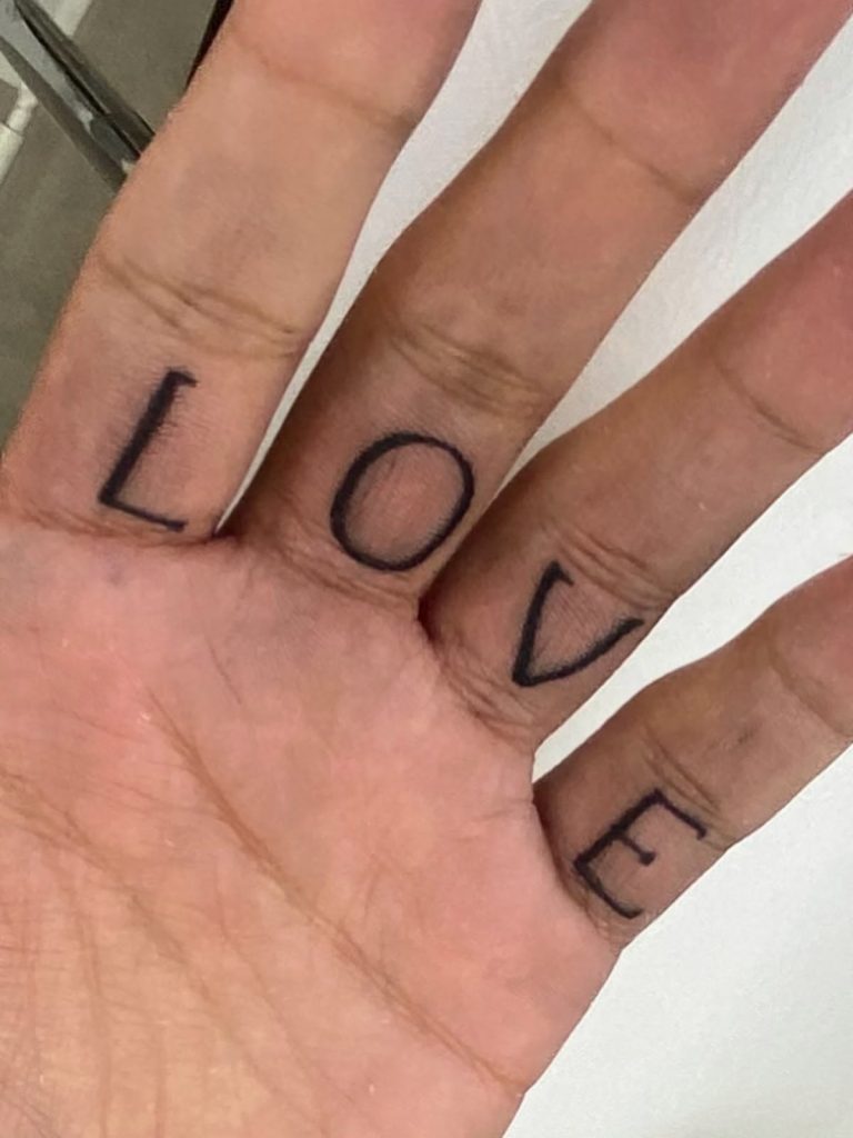 Elegant fine line tattoo by Woke Tattoo Studio
