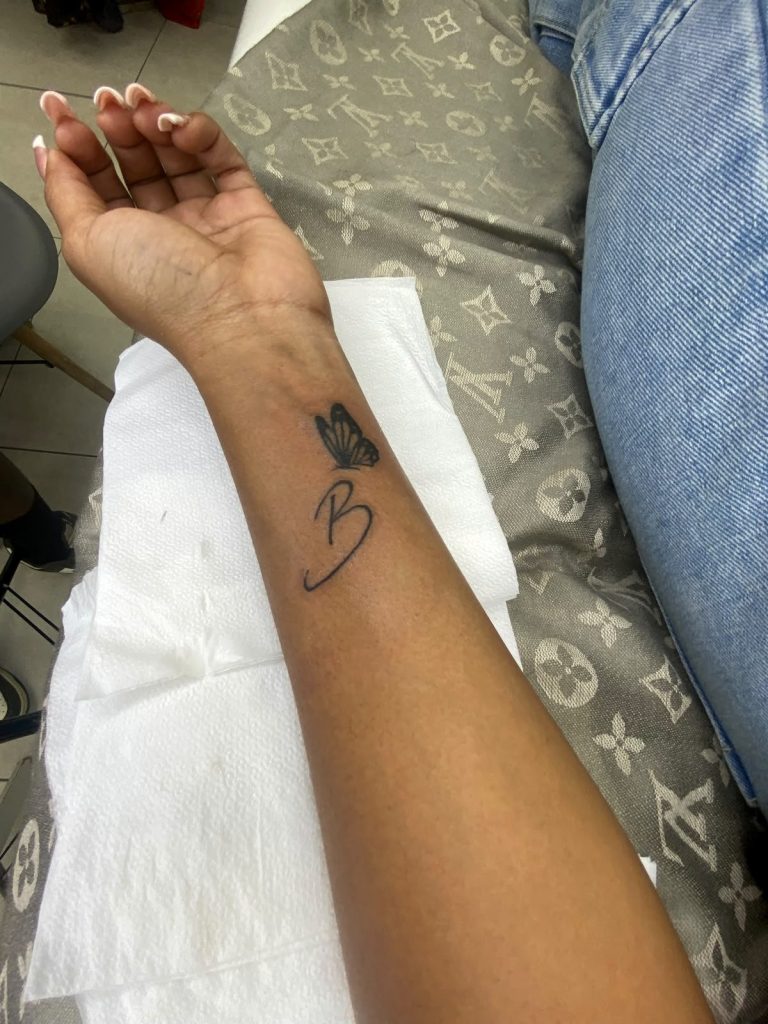 Fine line tattoo by Woke Tattoo Studio in Randburg