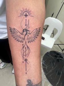 Fine line tattoo by Woke Tattoo Studio in Randburg