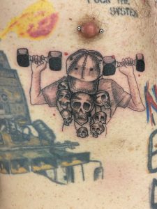 Black and grey tattoo by Woke Tattoo Studio