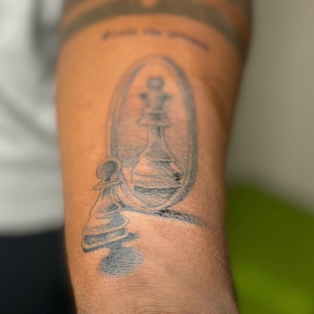Black and grey tattoo by Woke Tattoo Studio