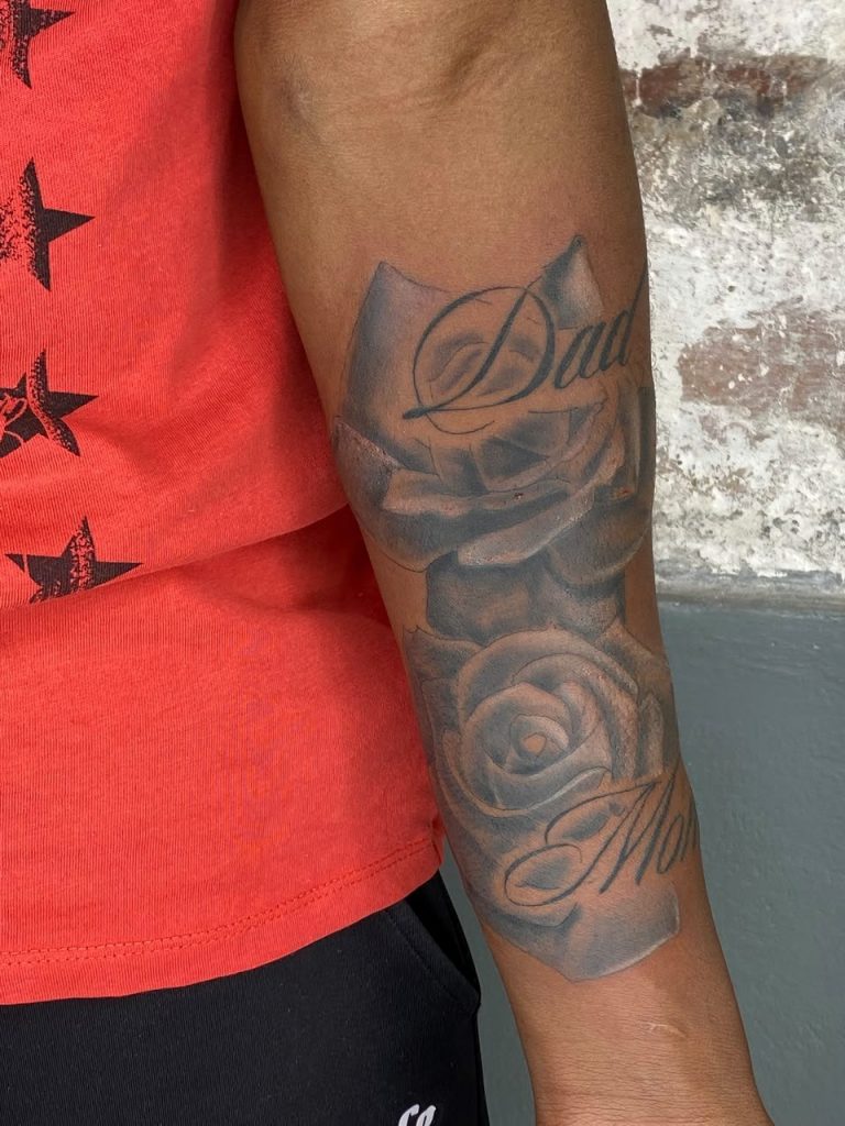 Black and grey tattoo by Woke Tattoo Studio
