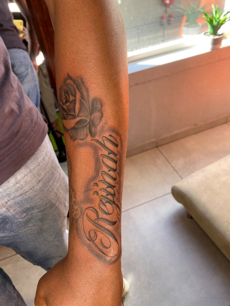 Black and grey tattoo by Woke Tattoo Studio