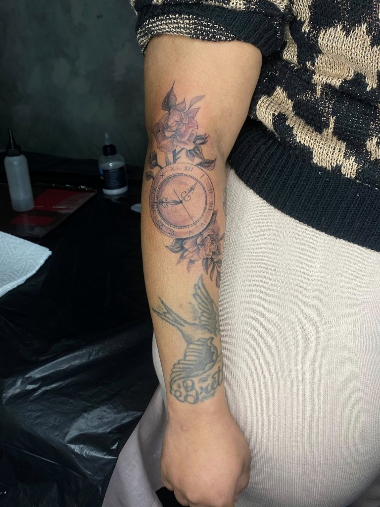 Black and grey tattoo by Woke Tattoo Studio