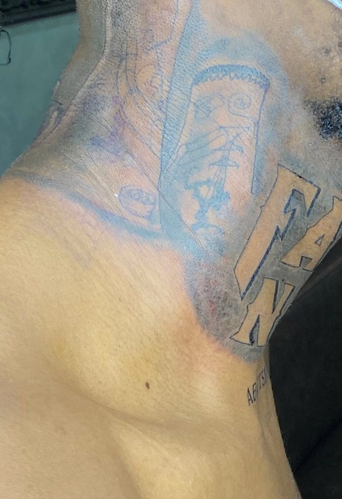 Black and grey tattoo by Woke Tattoo Studio