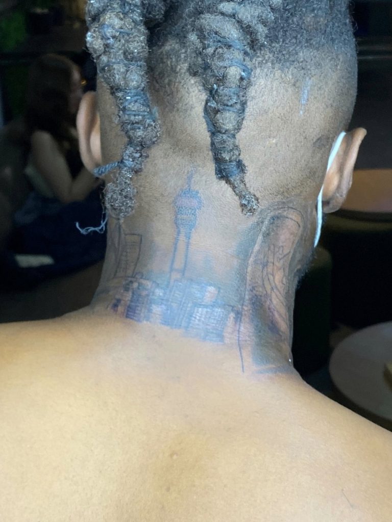 Black and grey tattoo by Woke Tattoo Studio
