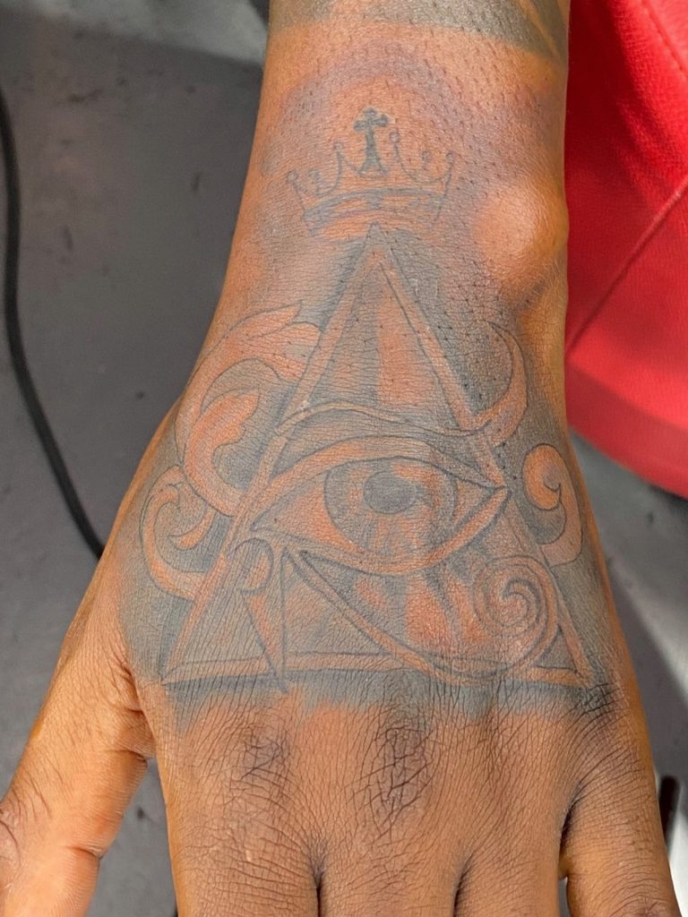 Black and grey tattoo by Woke Tattoo Studio