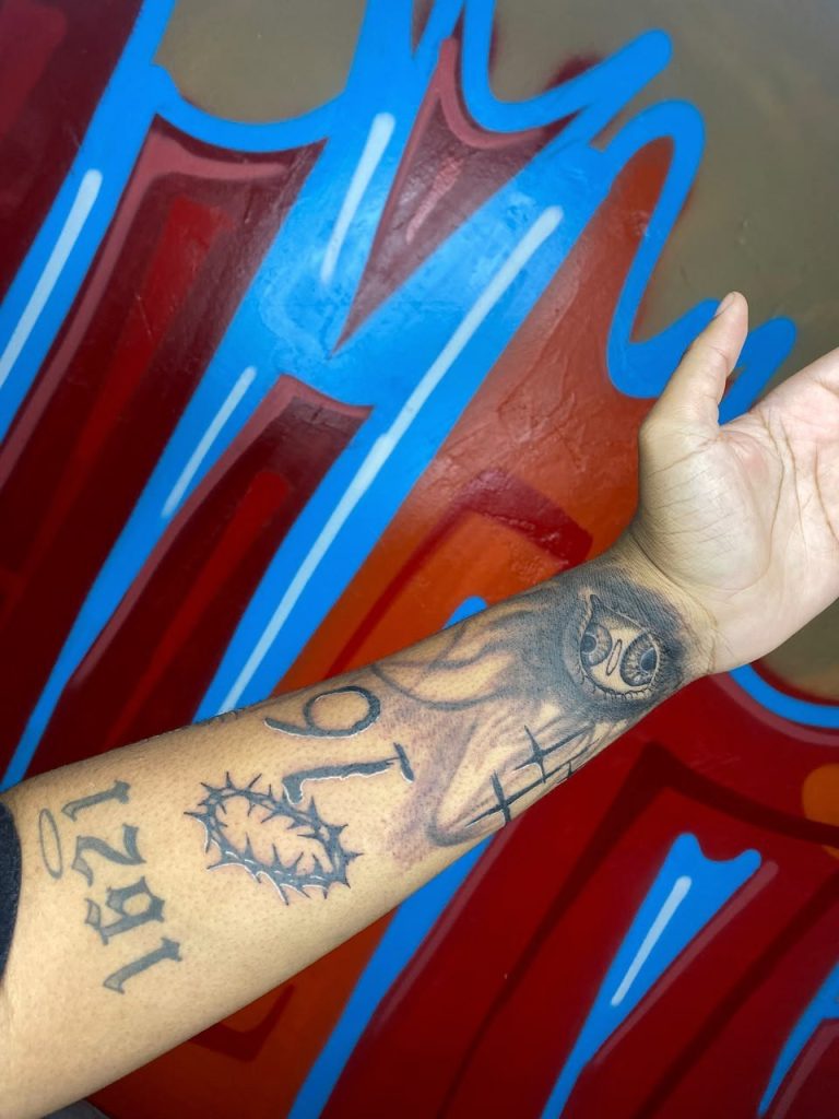 Black and grey tattoo by Woke Tattoo Studio