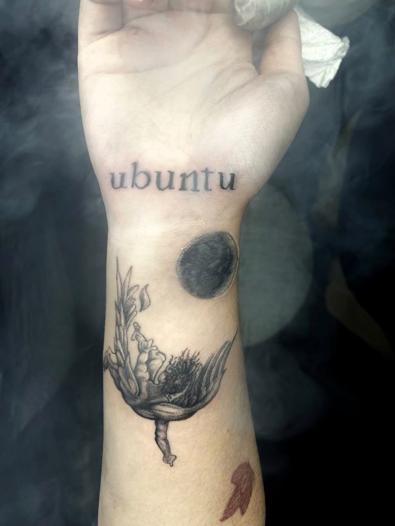 Black and grey tattoo by Woke Tattoo Studio