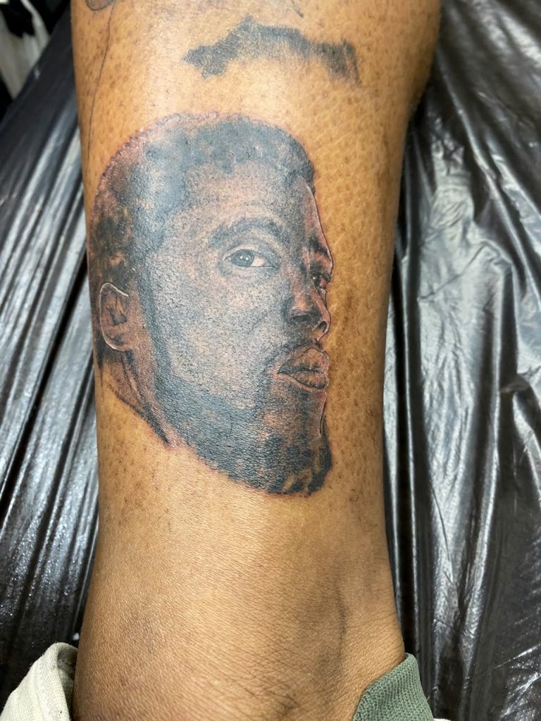 Black and grey tattoo by Woke Tattoo Studio