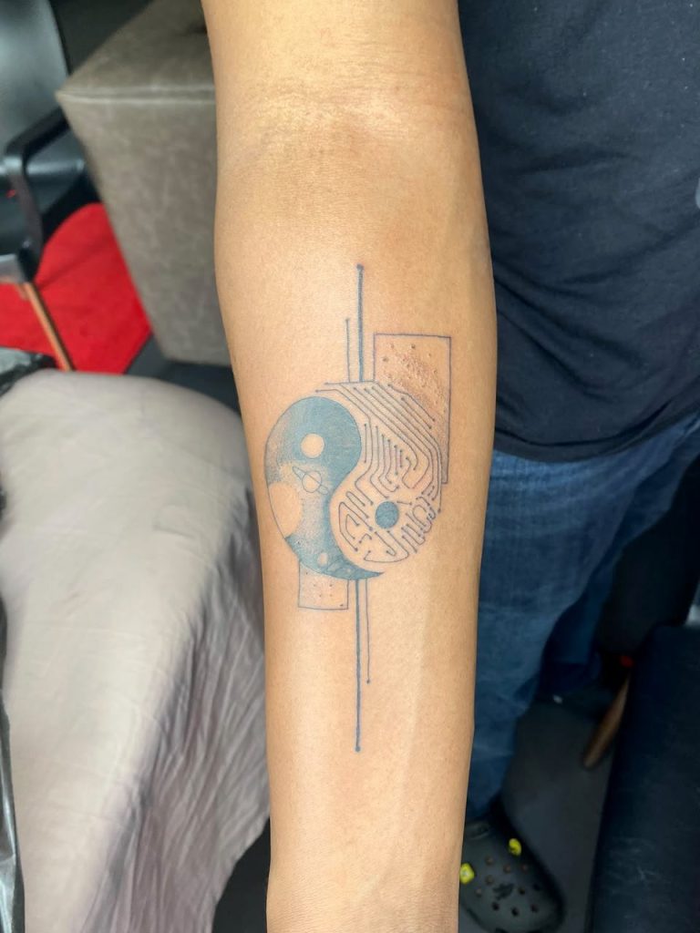 Black and grey tattoo by Woke Tattoo Studio