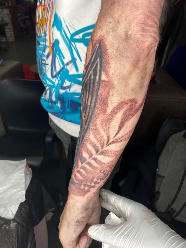 Black and grey tattoo by Woke Tattoo Studio