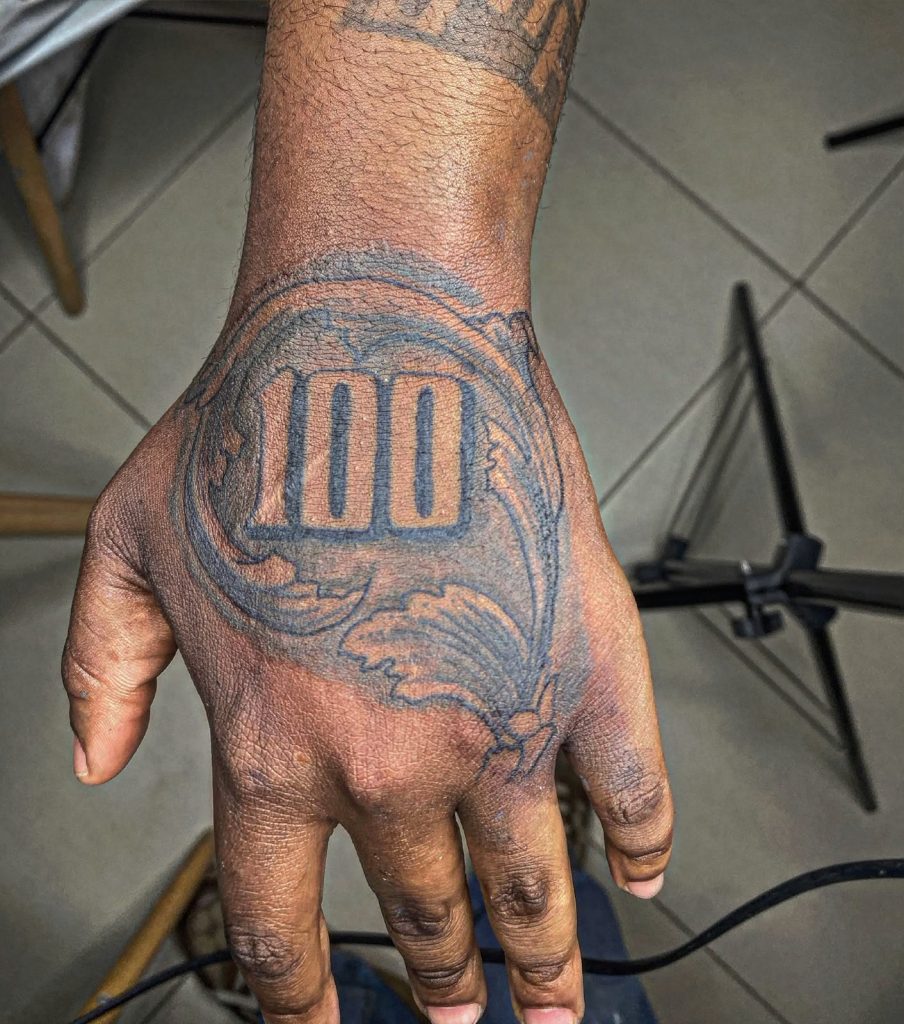 Black and grey tattoo by Woke Tattoo Studio