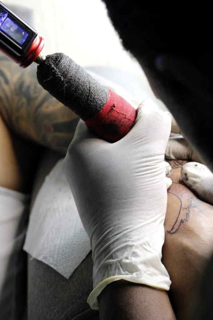 Professional luxury home tattoo appointment by Woke Tattoo Studio