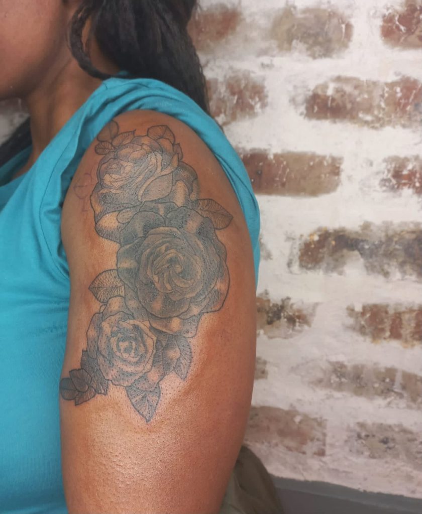 Black and grey tattoo by Woke Tattoo Studio