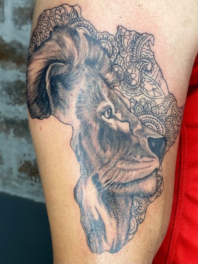 Black and grey tattoo by Woke Tattoo Studio