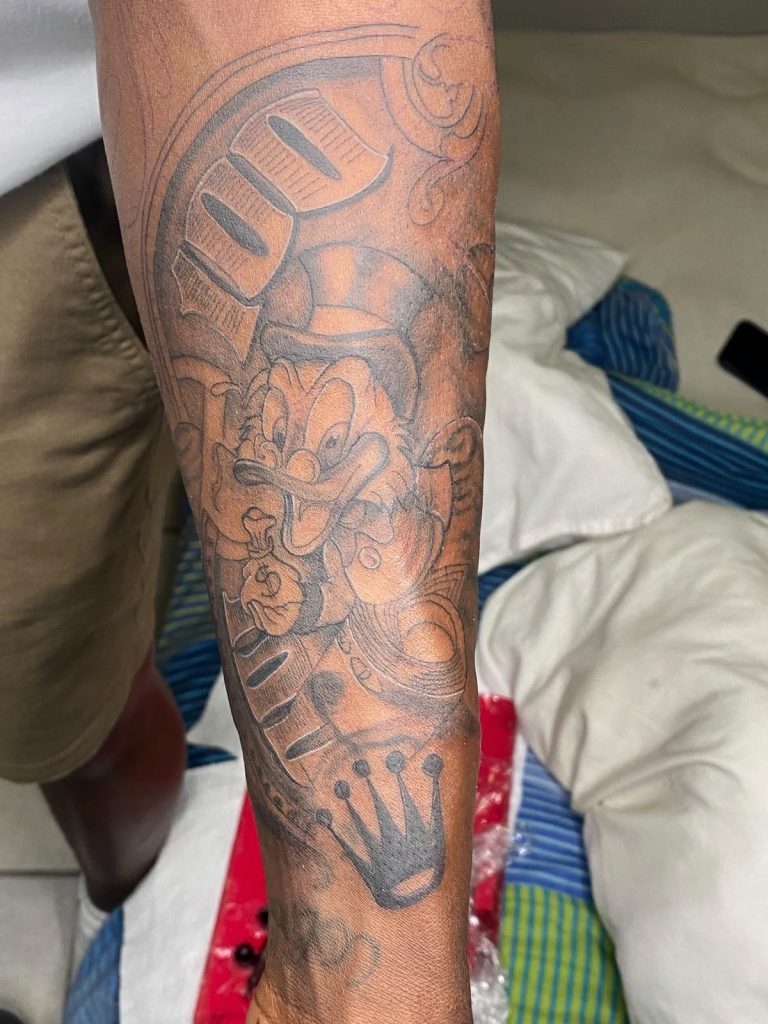 Black and grey tattoo by Woke Tattoo Studio
