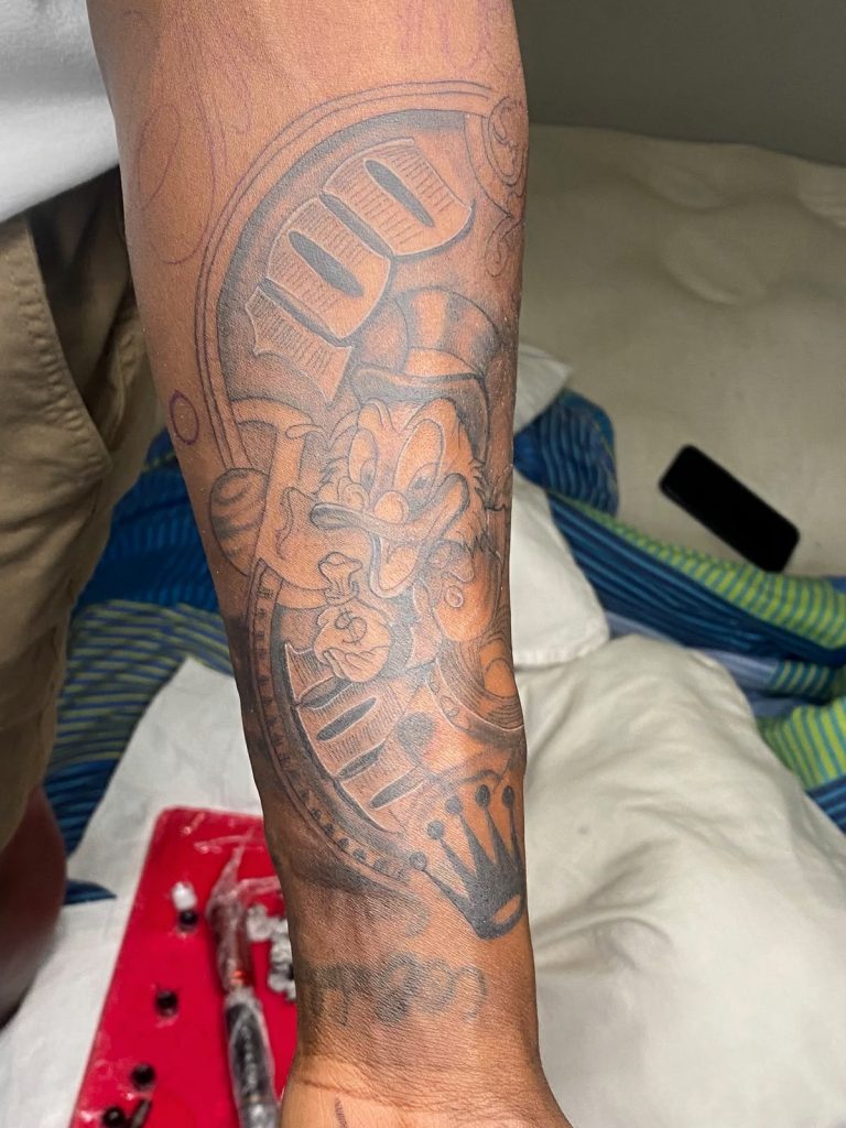 Black and grey tattoo by Woke Tattoo Studio