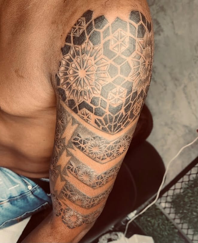 Black and grey tattoo by Woke Tattoo Studio