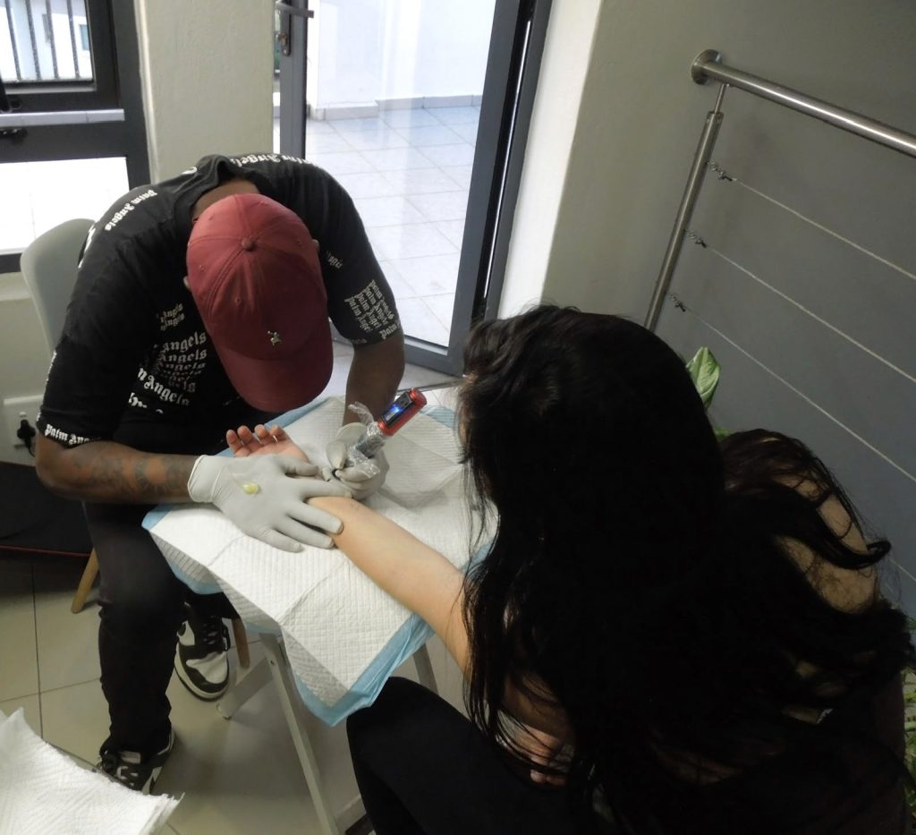 Luxury home tattoo experience by Woke Tattoo Studio in Johannesburg