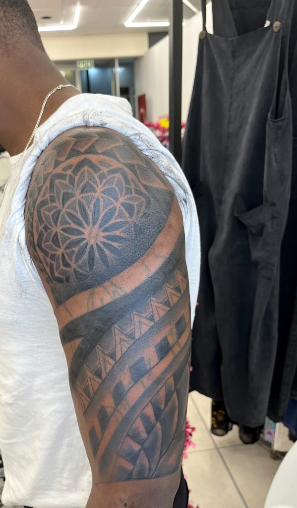 Cover-up tattoo transformation by Woke Tattoo Studio