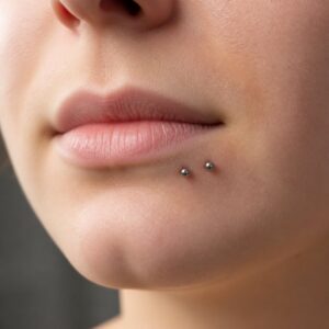 Spider bites piercings
